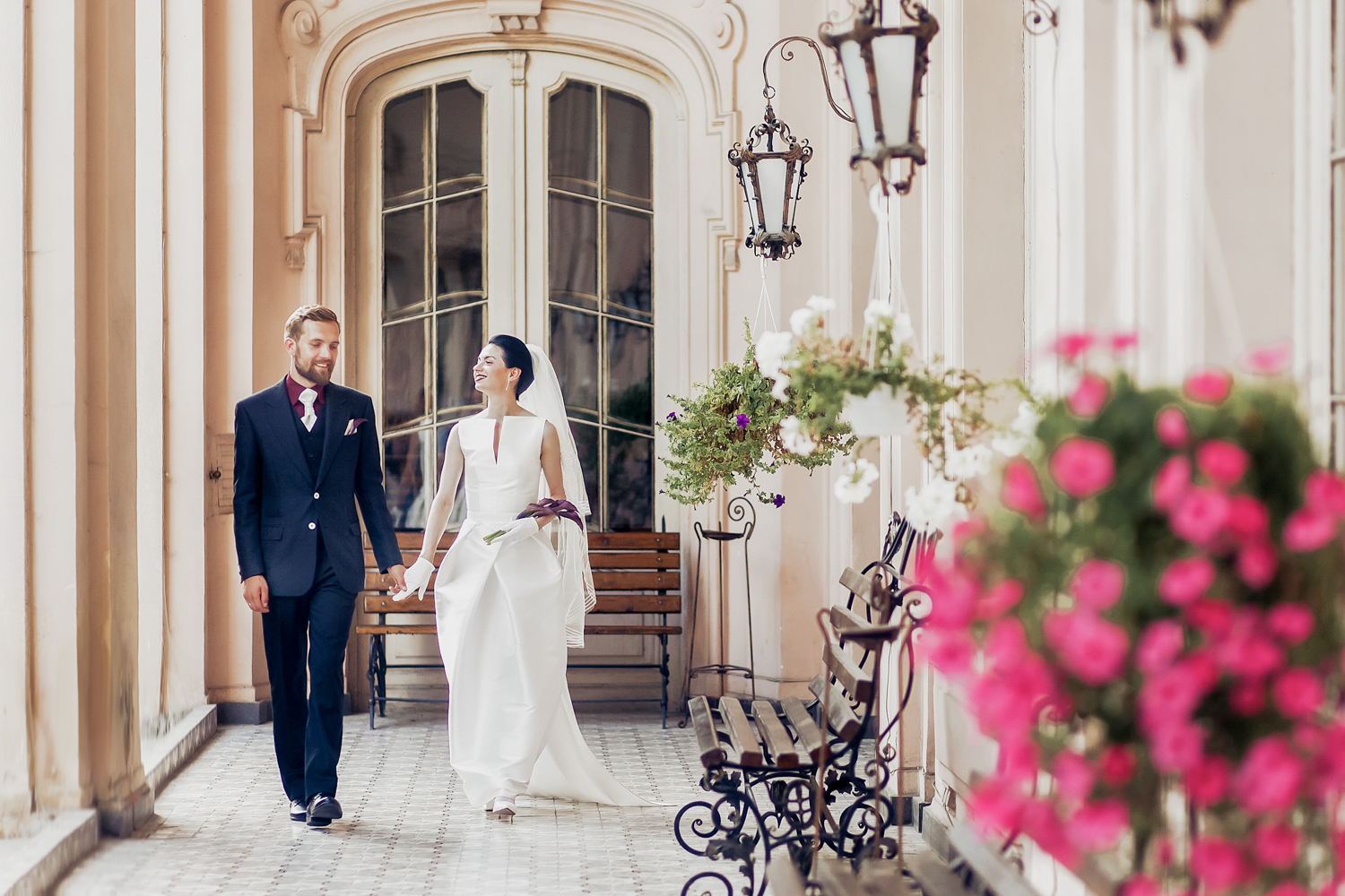 Bride and groom looking calm at a hotel after the hotel booking issue for their destination wedding.