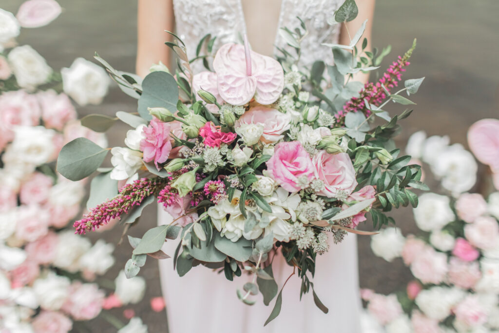 A bride at a scenic location in Ireland, showcasing a picturesque destination wedding setting.