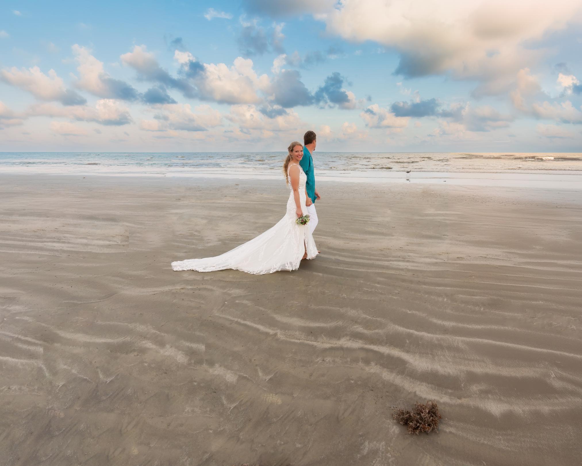 Beach Galveston Wedding Venues are romantic backdrops for your special day, as depicted by this bride and groom walking at sunset.